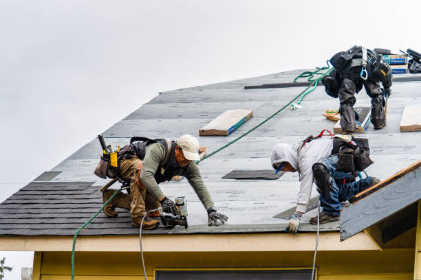 Professional Storm Damage Roof Repair technician working in Poland, IN